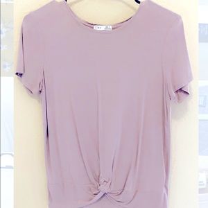 Light pastel purple top.